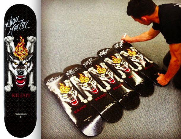 Kilian Martin signing his pro model boards for Grind for Life foundation.